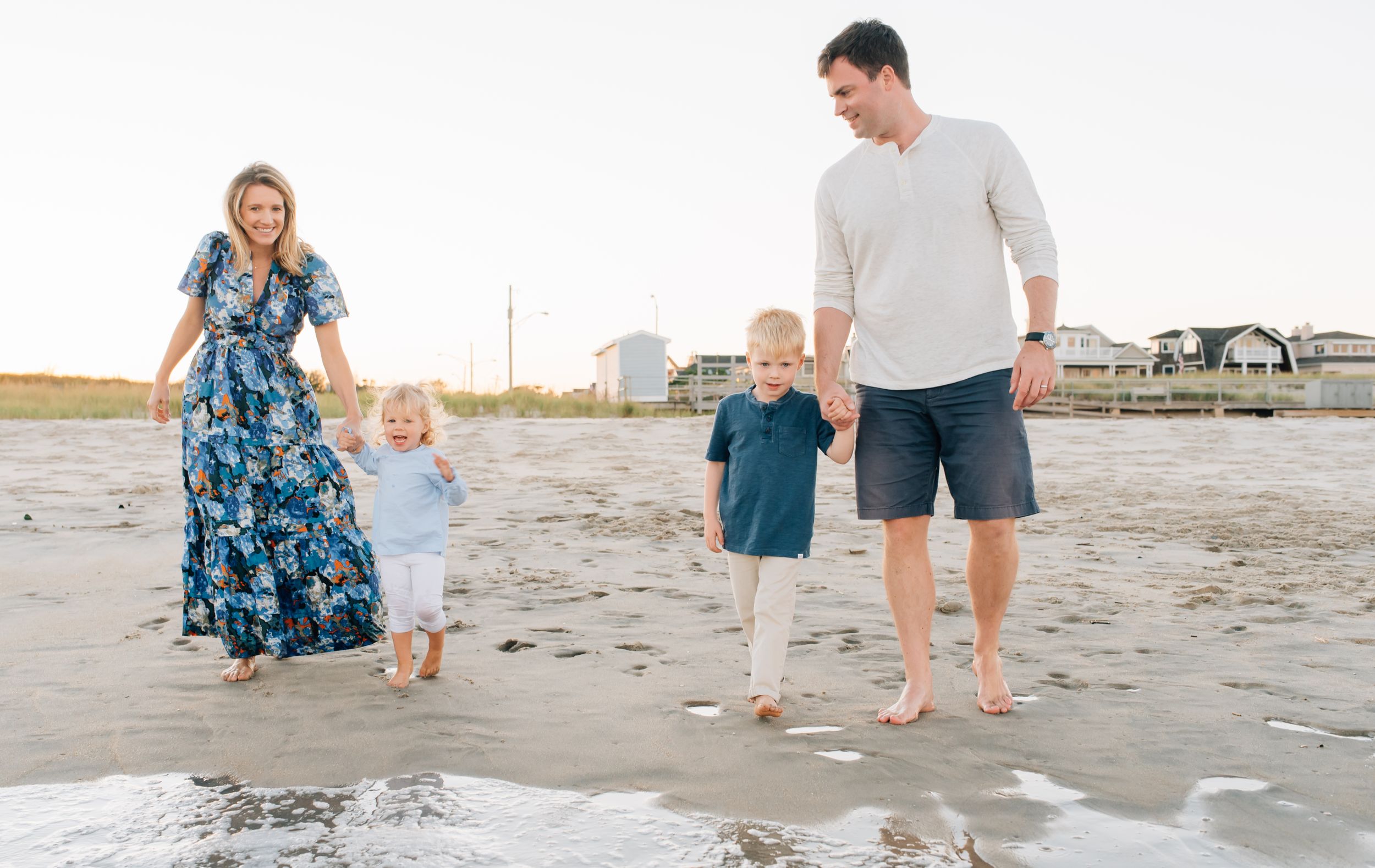 Running into the water at sunset on the beach in Spring Lake NJ - Lauren Marie Photography