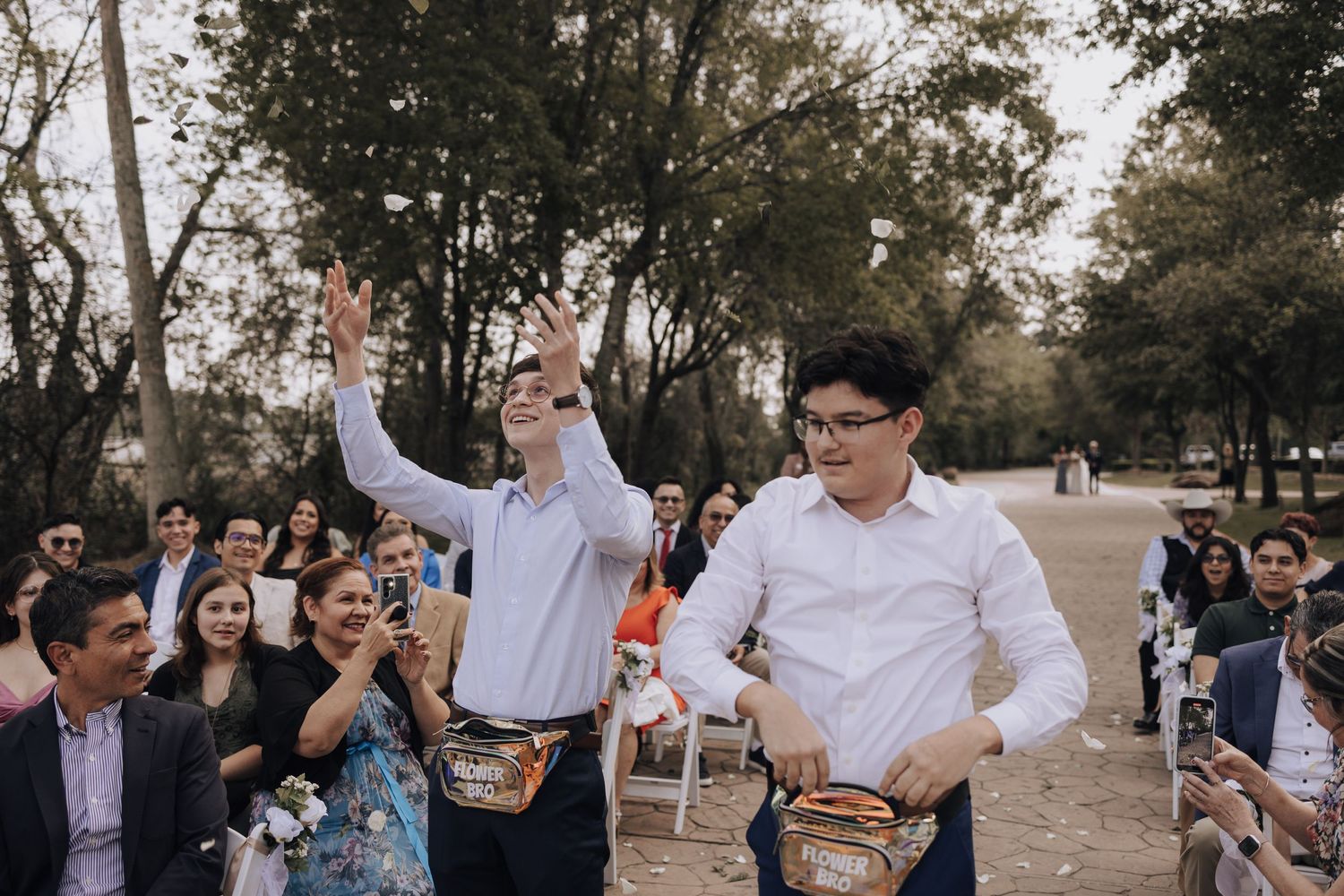 Energetic dance performance with drums during outdoor wedding celebration.