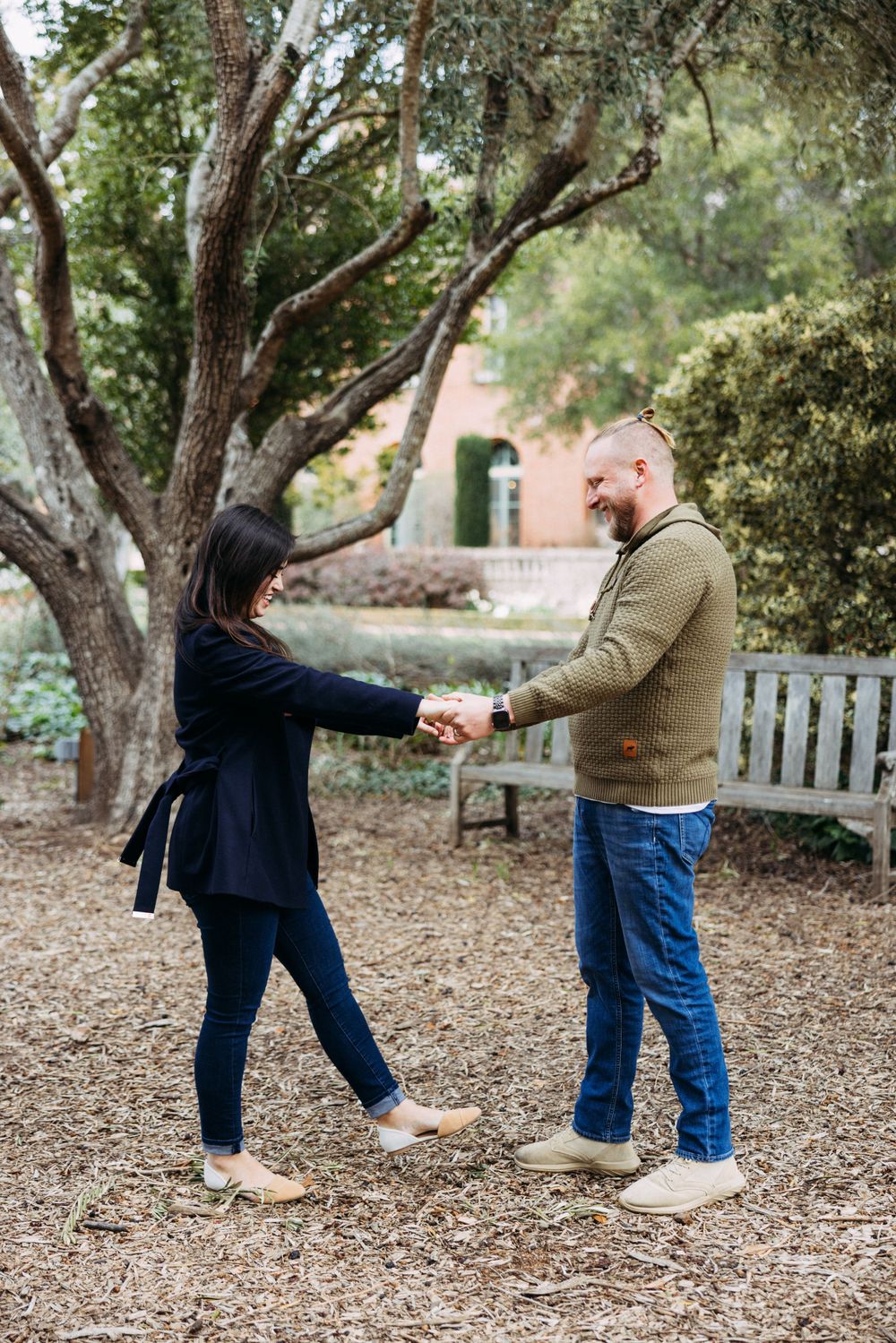 Couple dances in olive grove in Bay Area, California