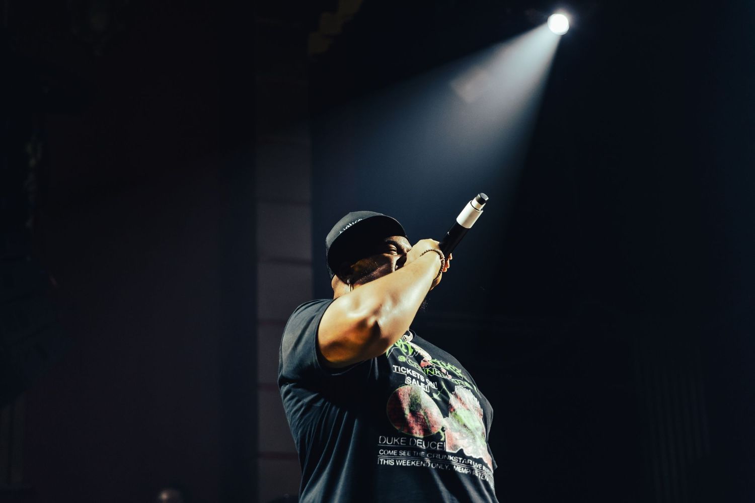 Close-up of rapper performing at music festival, duke duce