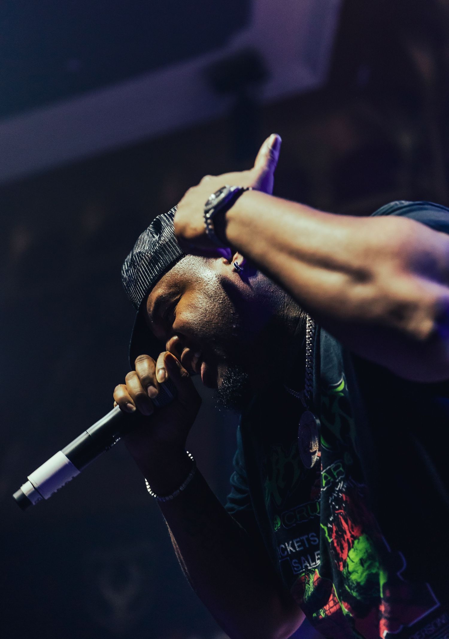 Close-up of rapper performing at music festival