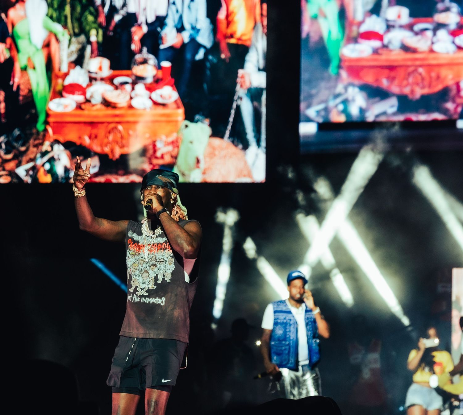 Hip-hop artist engaging with crowd at concert, young thug, birthday bash