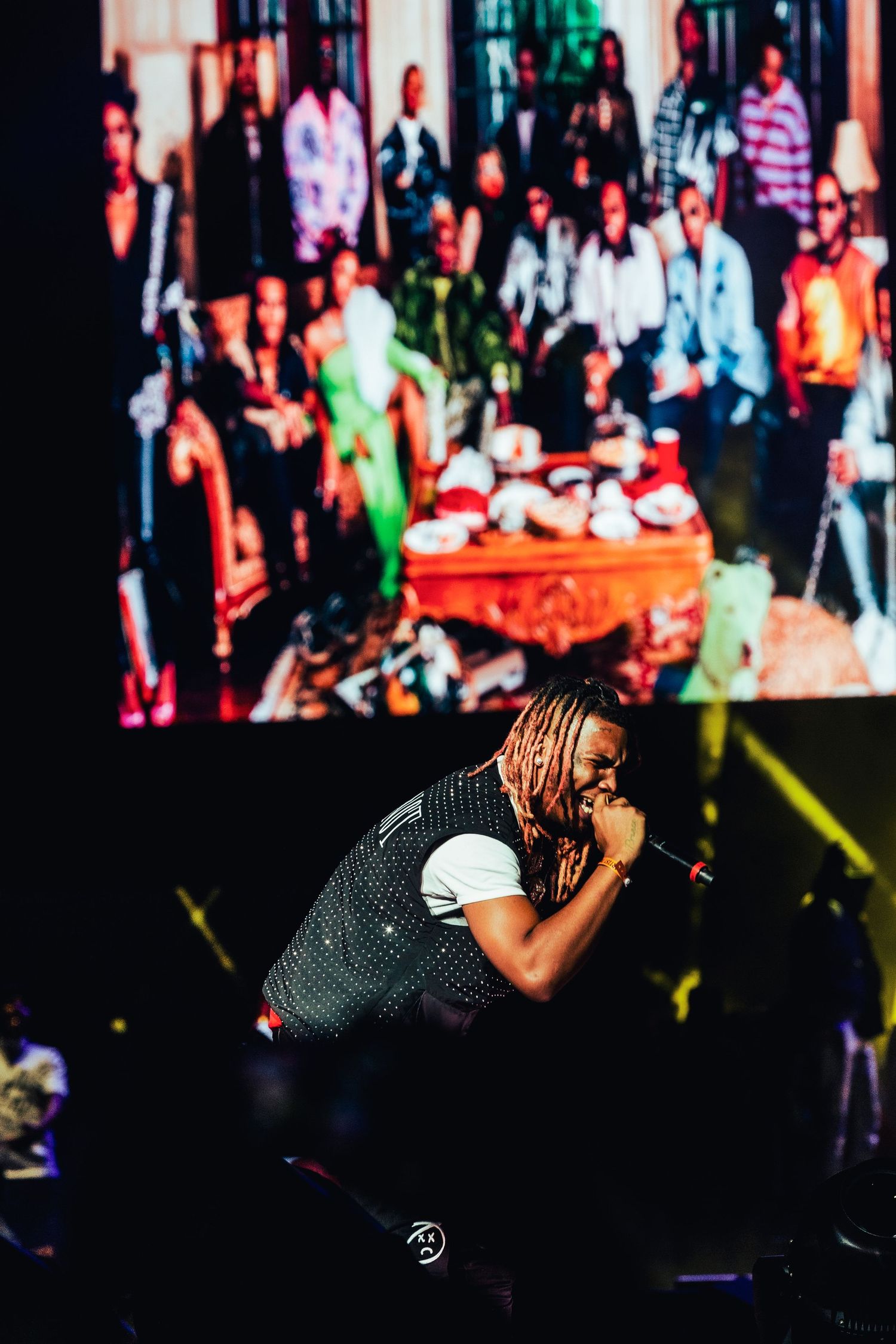 lil keed, engaging with crowd at concert