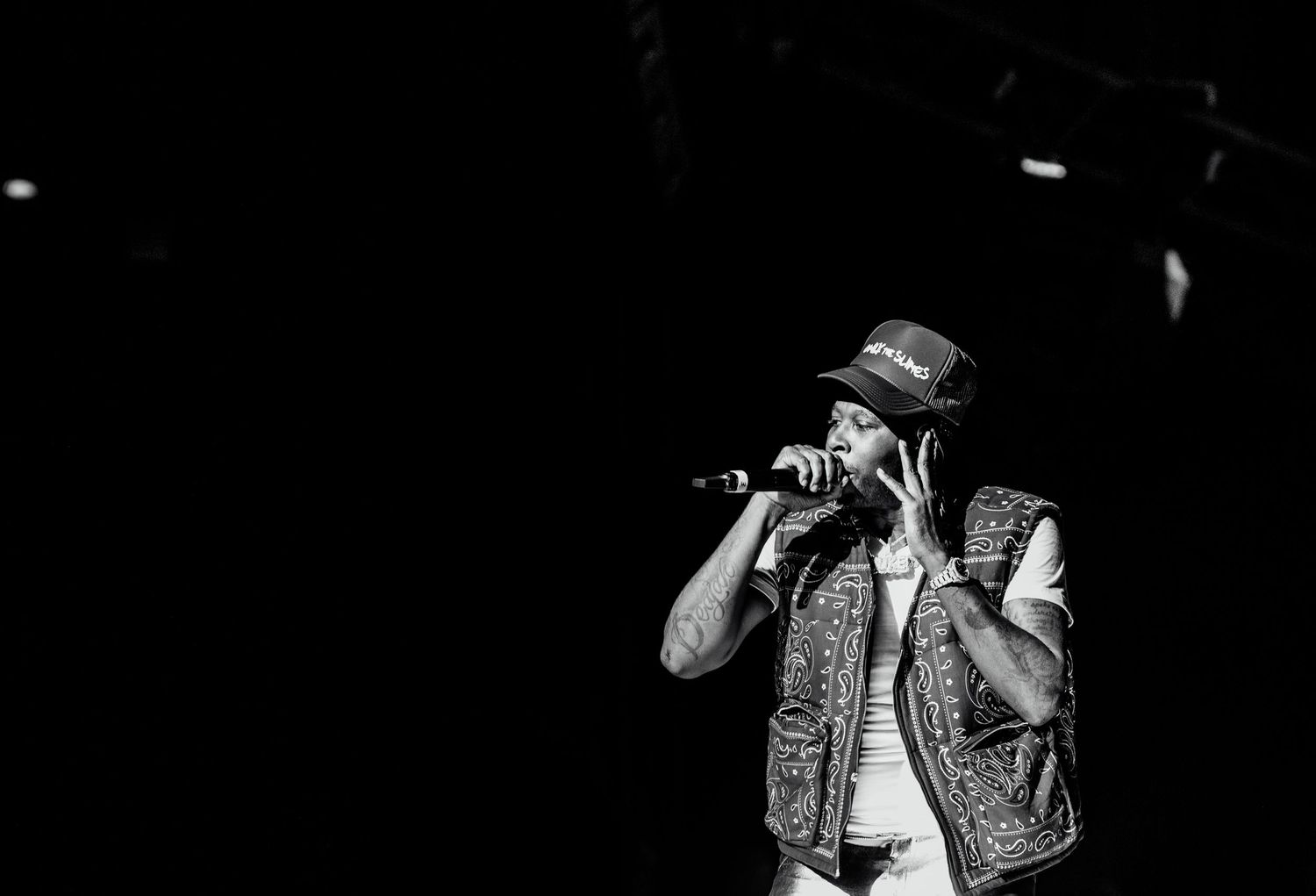 Close-up of rapper performing at music festival, duke