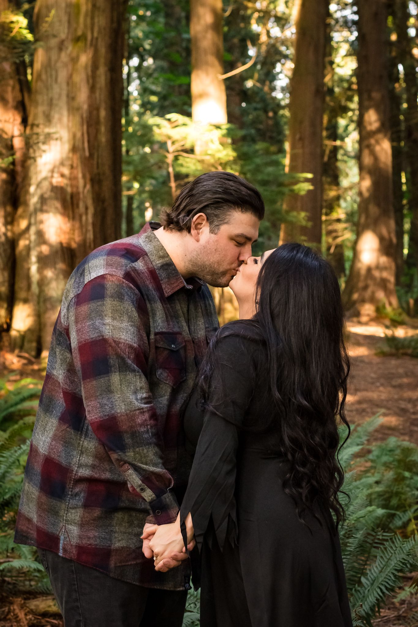 couple kissing in the forest, outdoor couples session, couples portrait session, sunlight and trees, Maple Ridge
