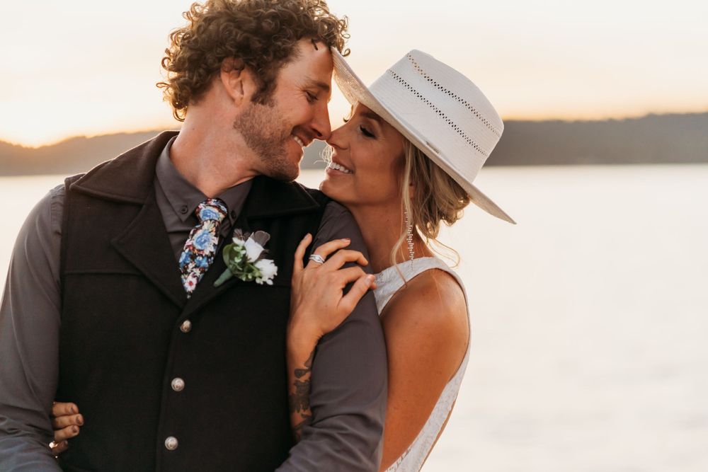 Intimate moment captured at sunset by the waterfront.