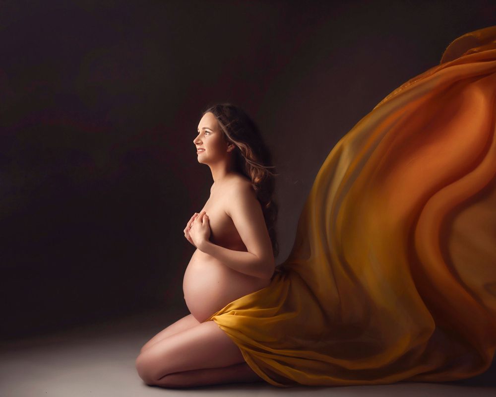 Maternity nude photo floating fabric