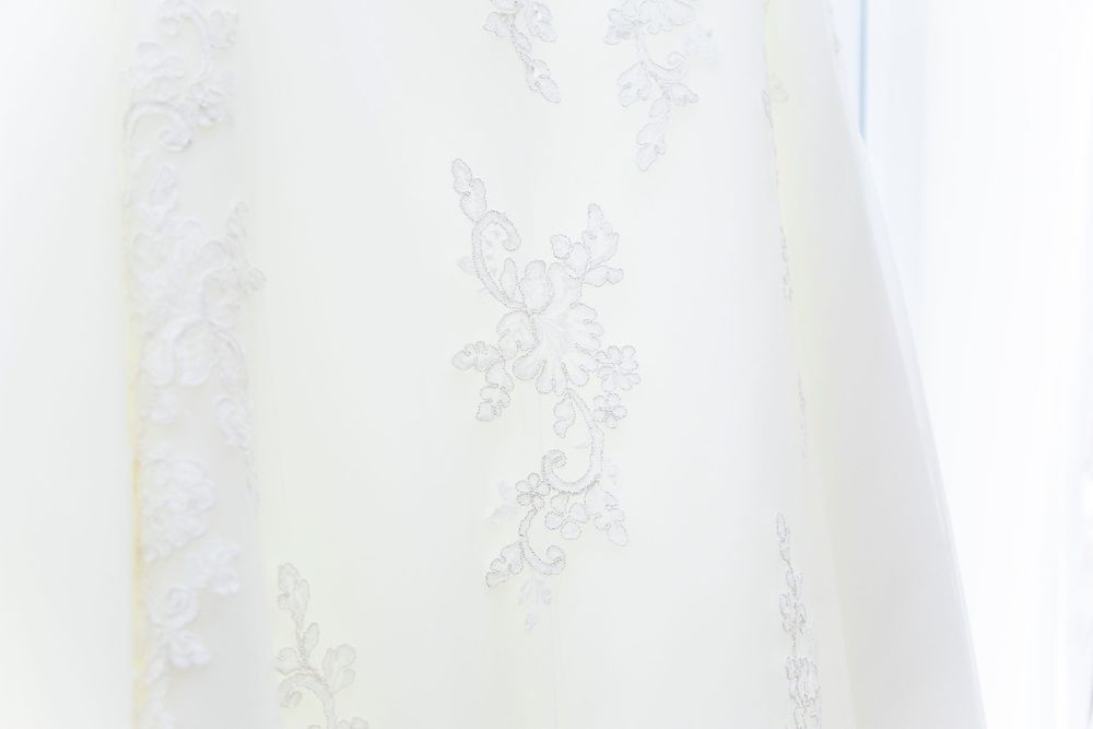 Close up details of the wedding dress