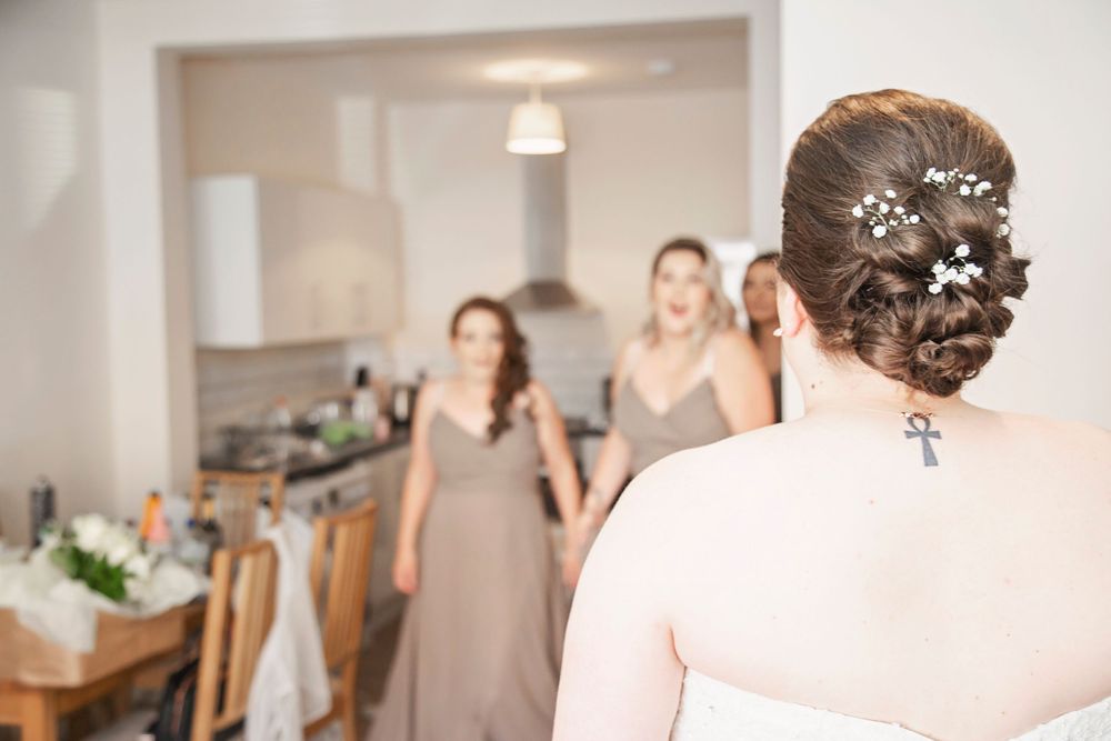 Bridesmaids first look at bride, Hertfordshire