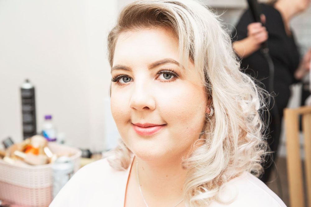 Stunning bridesmaid getting ready for Hertfordshire wedding