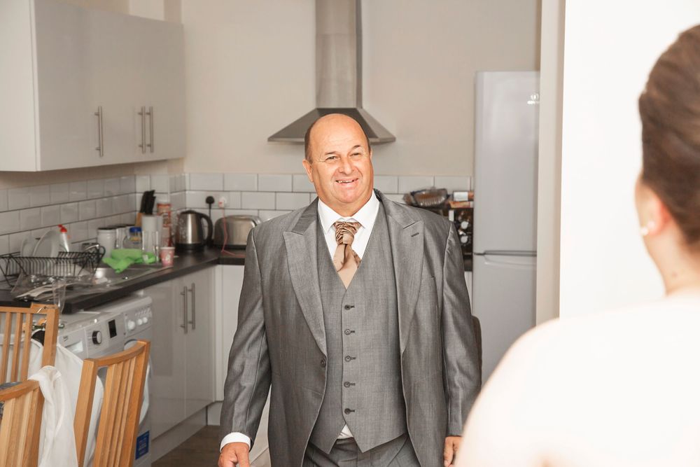 Father of the bride seeing his daughter for the first time