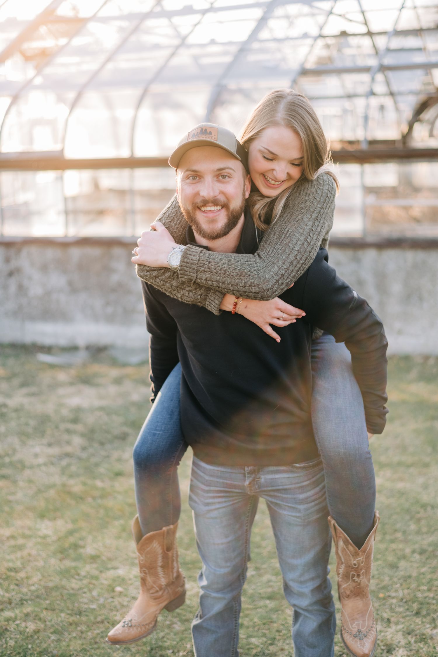 man giving woman a piggy back ride