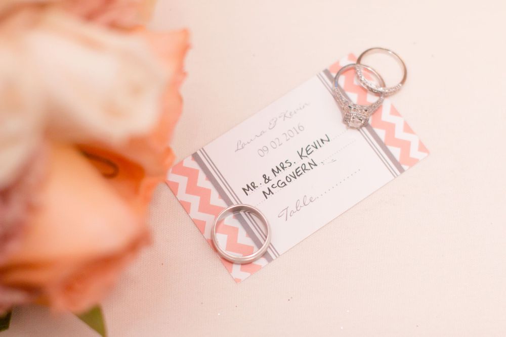 Wedding favor tag with chevron pink ribbons and a soft pink rose in the background.