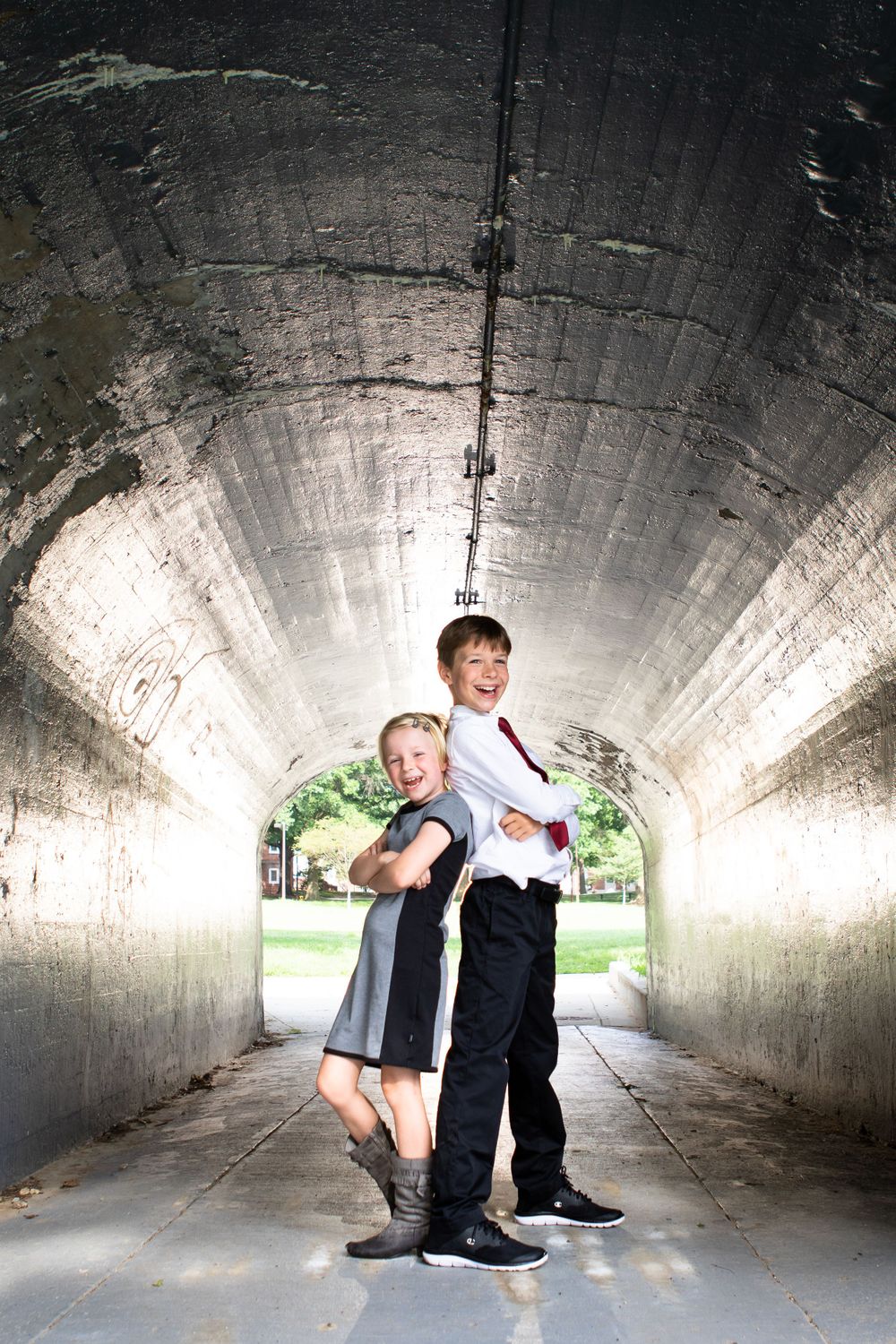 Mother and child portrait in dramatic tunnel with natural light