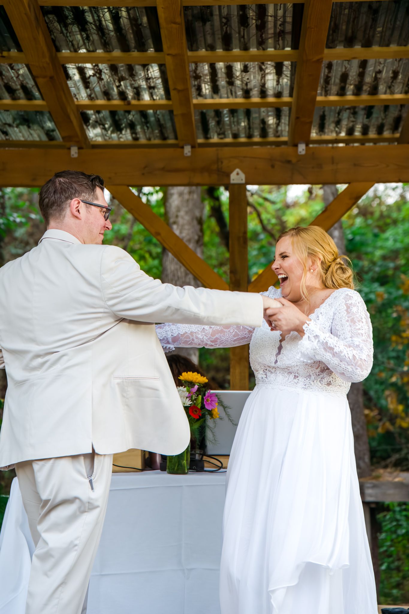 bride and groom dance together