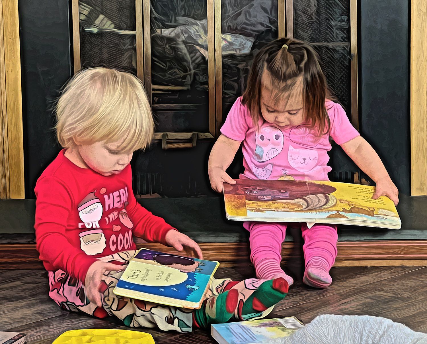 Toddler boy and girl reading books