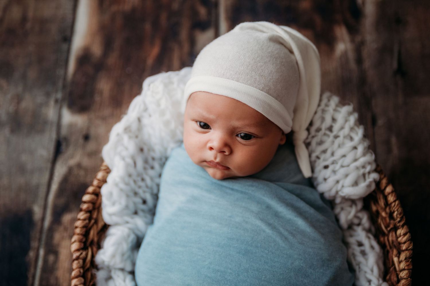 wrapped newborn posed photographer studio trained skilled professional NY WNY East Aurora buffalo