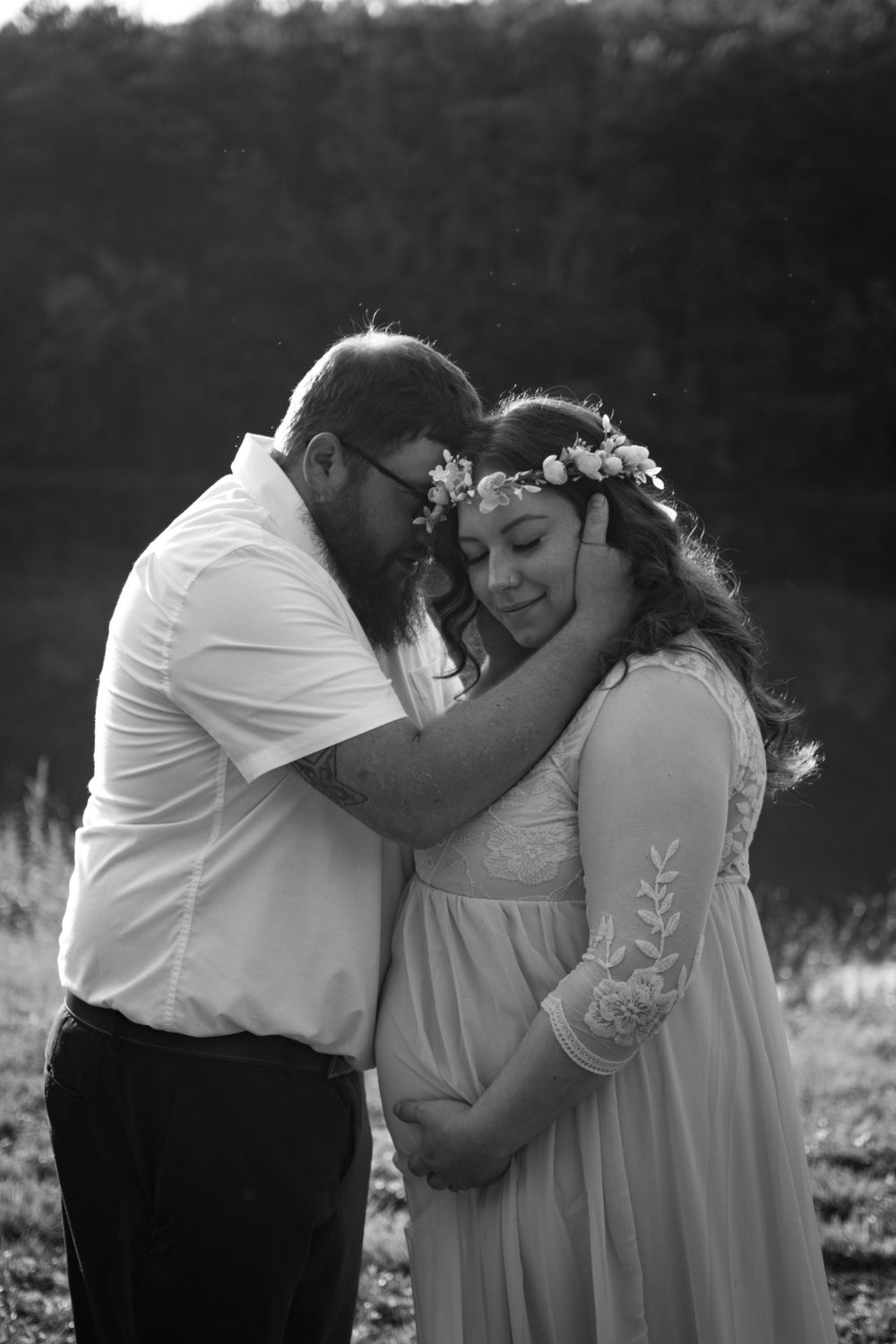 Black and white series of tender moments between a couple during an outdoor photoshoot.
