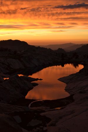 Reflective Orange Sunset in the High Sierra, CA
