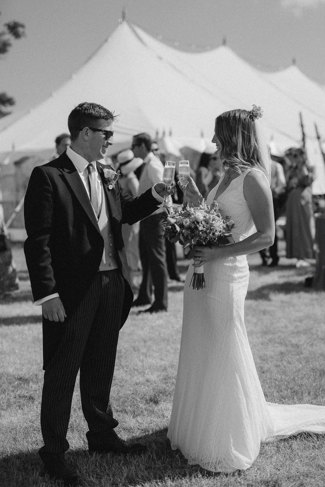 Documentary-style wedding photography of the bride and a wedding guests