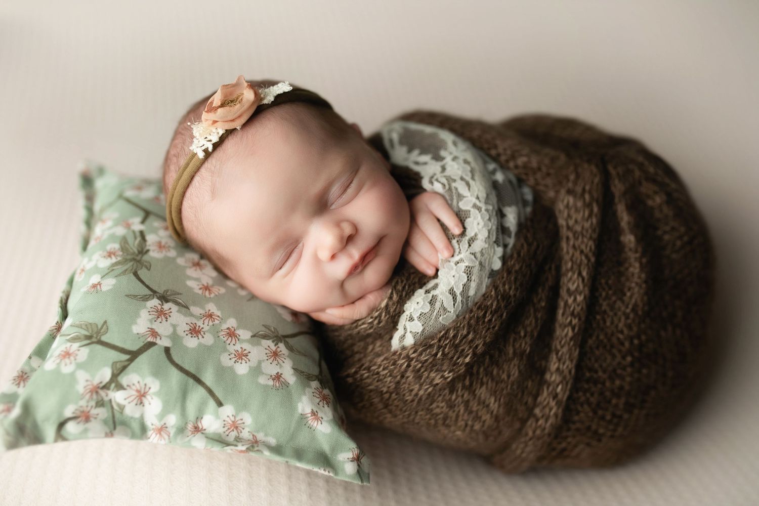Newborn girl in brown wrap. Greenville sc newborn photographer, Easley sc newborn photographer, Upstate sc newborn photographer