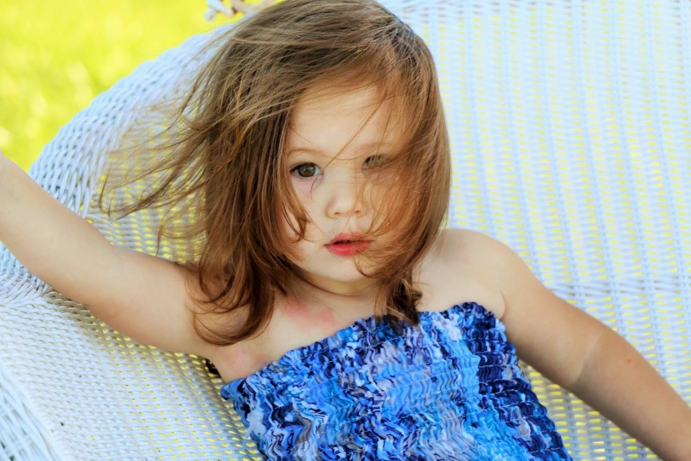 Artistic portrait series with yellow background and white lace details.