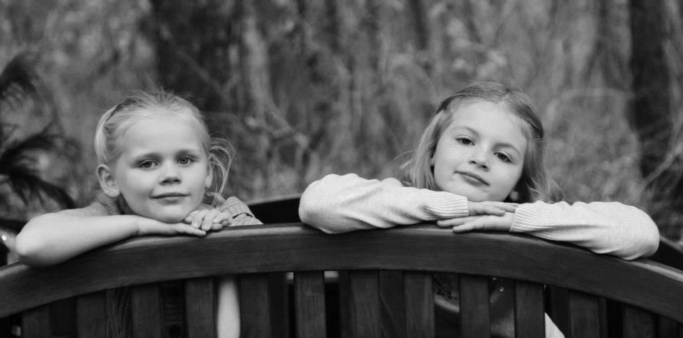A series of black and white outdoor portrait photographs showing different expressions and poses.