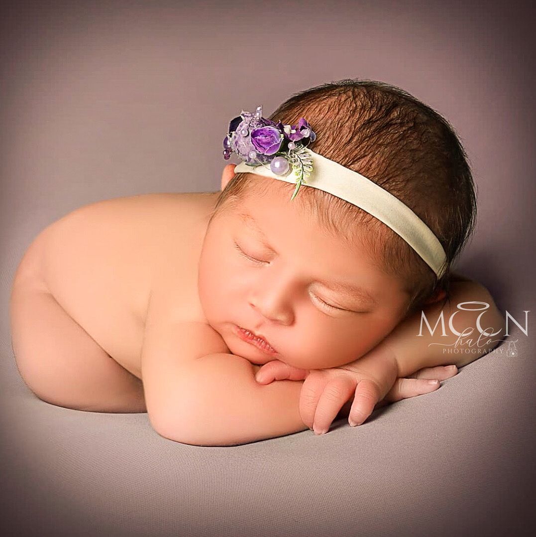 Professional newborn, maternity, family, and cake smash photography in Hayes, West London. Custom studio and home sessions with props