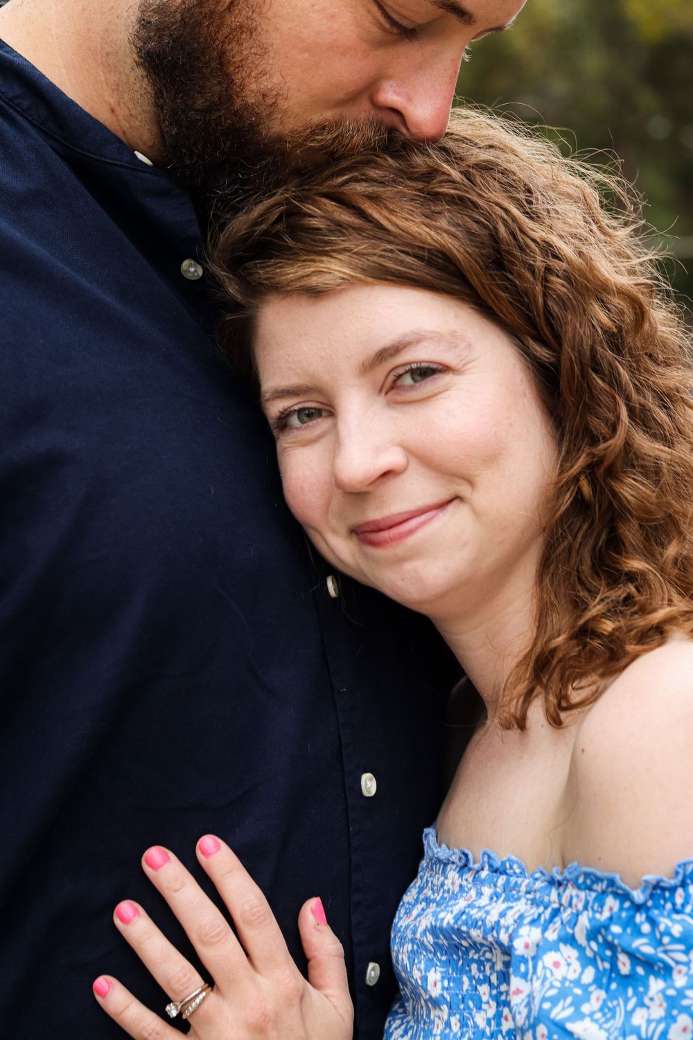 Close-up shots showing affectionate moments and a ring display.