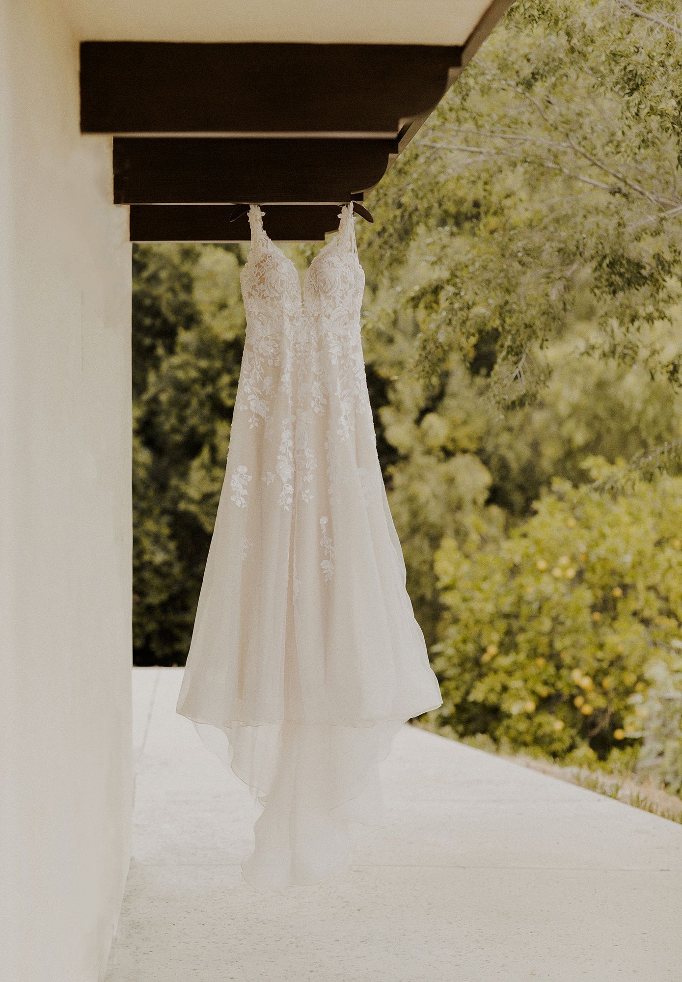 E Noelle Photography in-home wedding in Hidden Hills Los Angeles, hanging dress detail shot