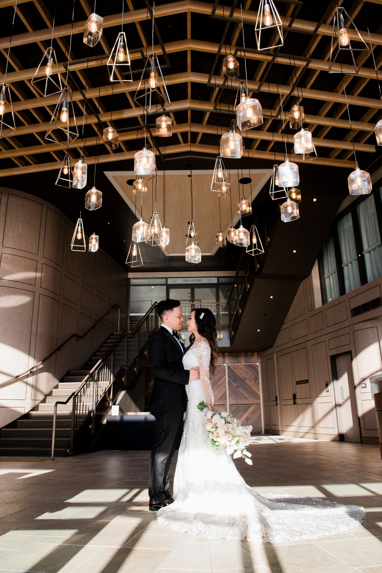 Bride and groom at William Inglis Hotel Lobby during their photoshoot