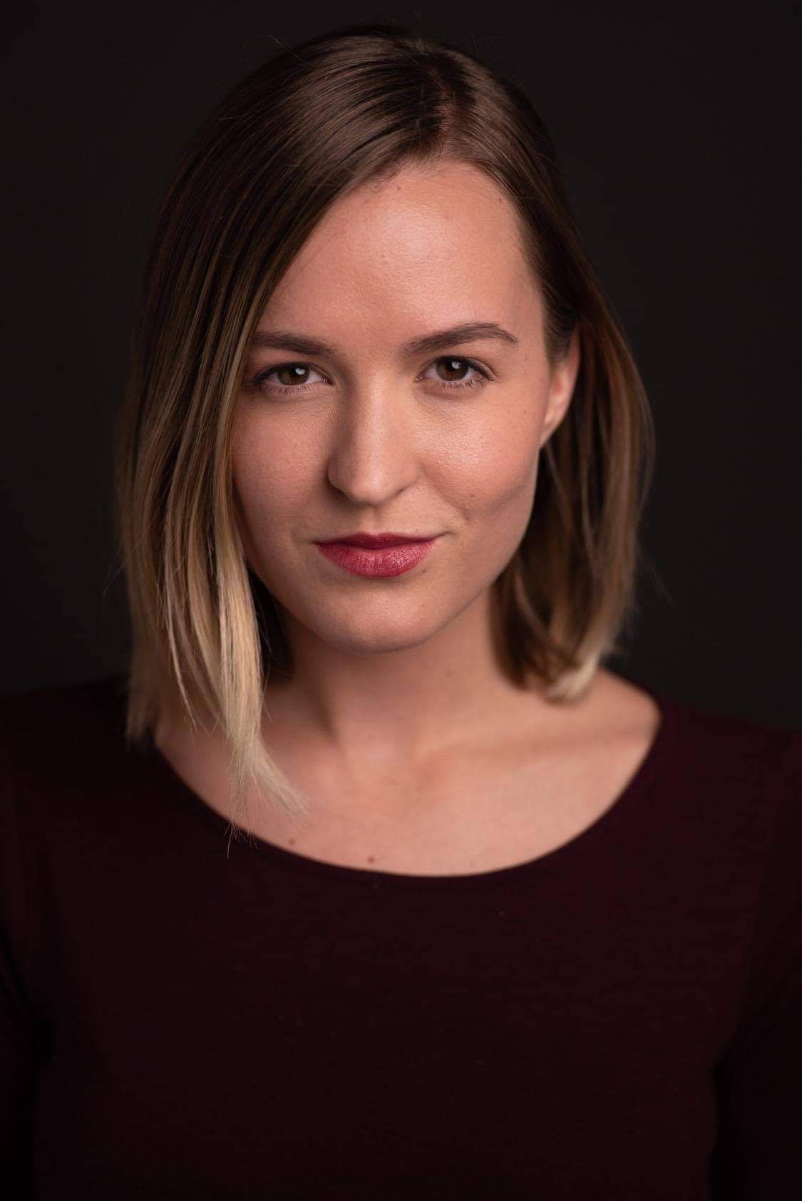 Actor, Ashley Deuell as Laura
