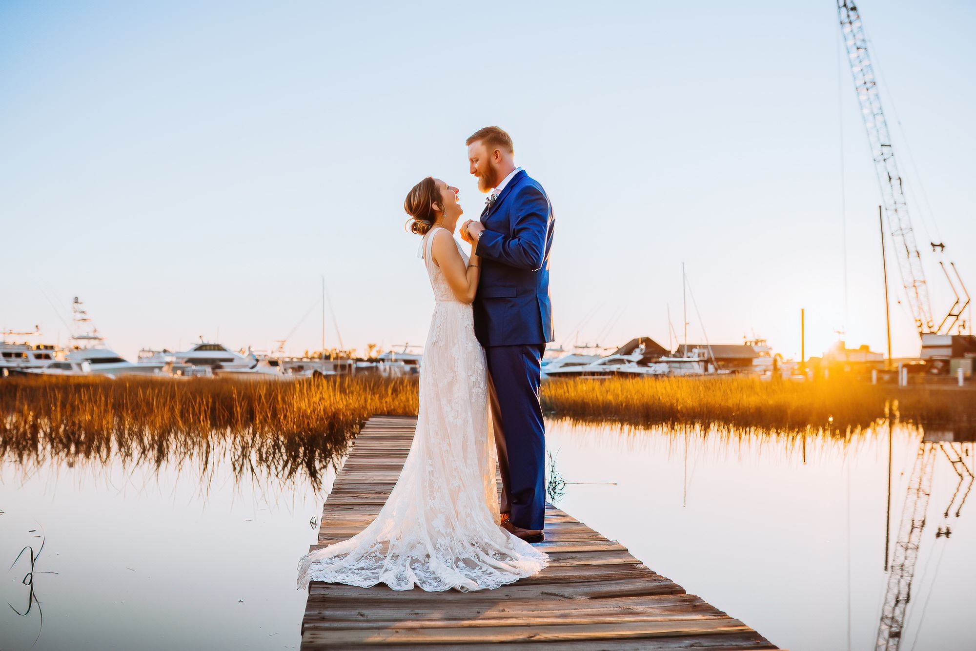 couple on marsh at sunset