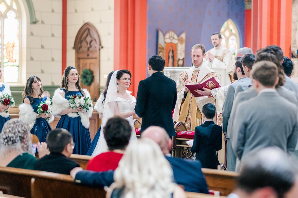Bride and groom during their wedding mass at Holy Family Cathedral, Tulsa, OK.