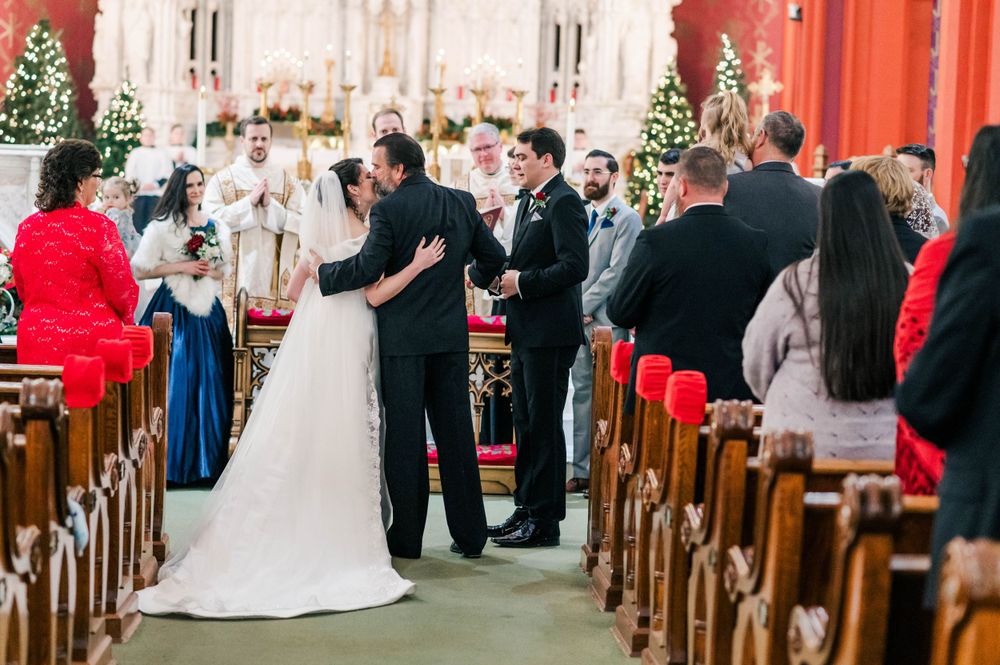 Bride and groom during their wedding mass at Holy Family Cathedral, Tulsa, OK.