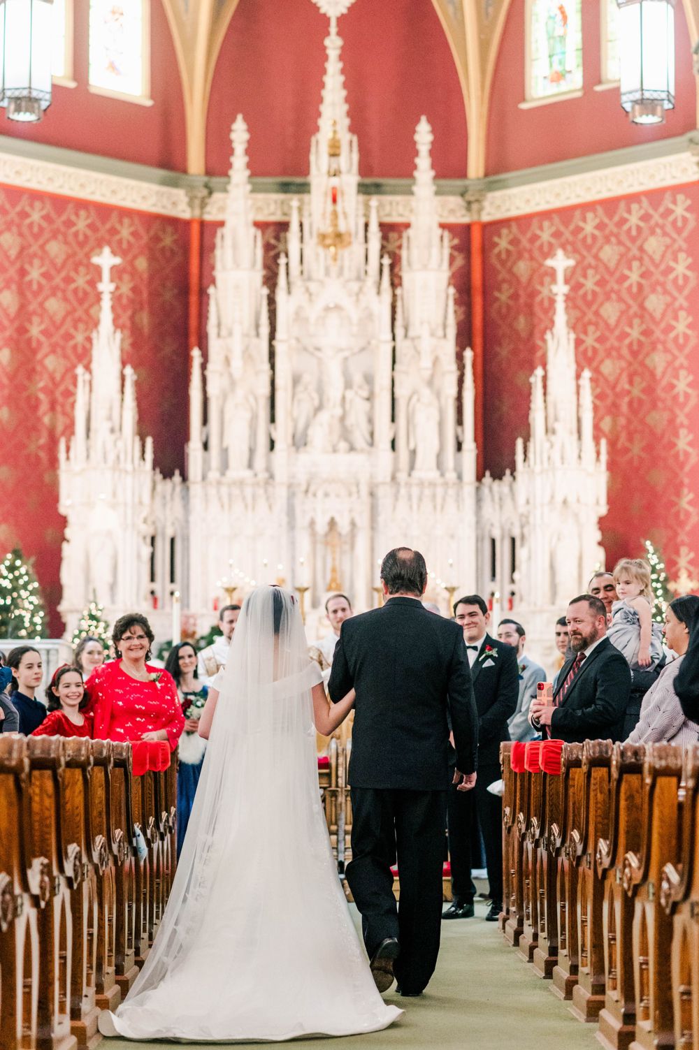 Bride and groom during their wedding mass at Holy Family Cathedral, Tulsa, OK.