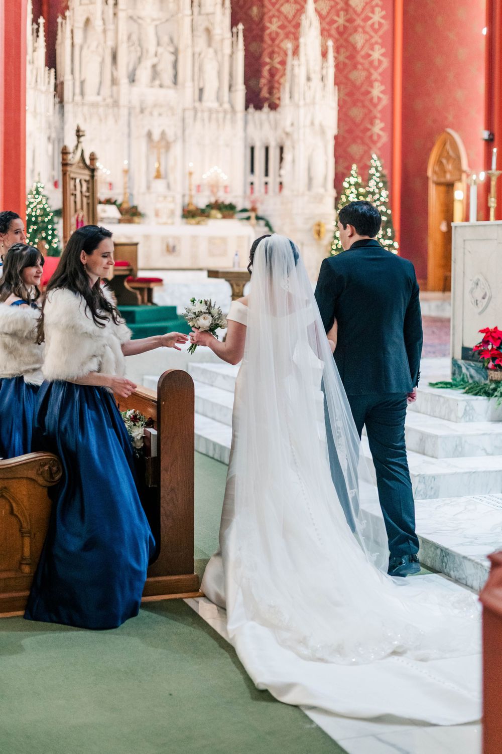 Bride and groom during their wedding mass at Holy Family Cathedral, Tulsa, OK.