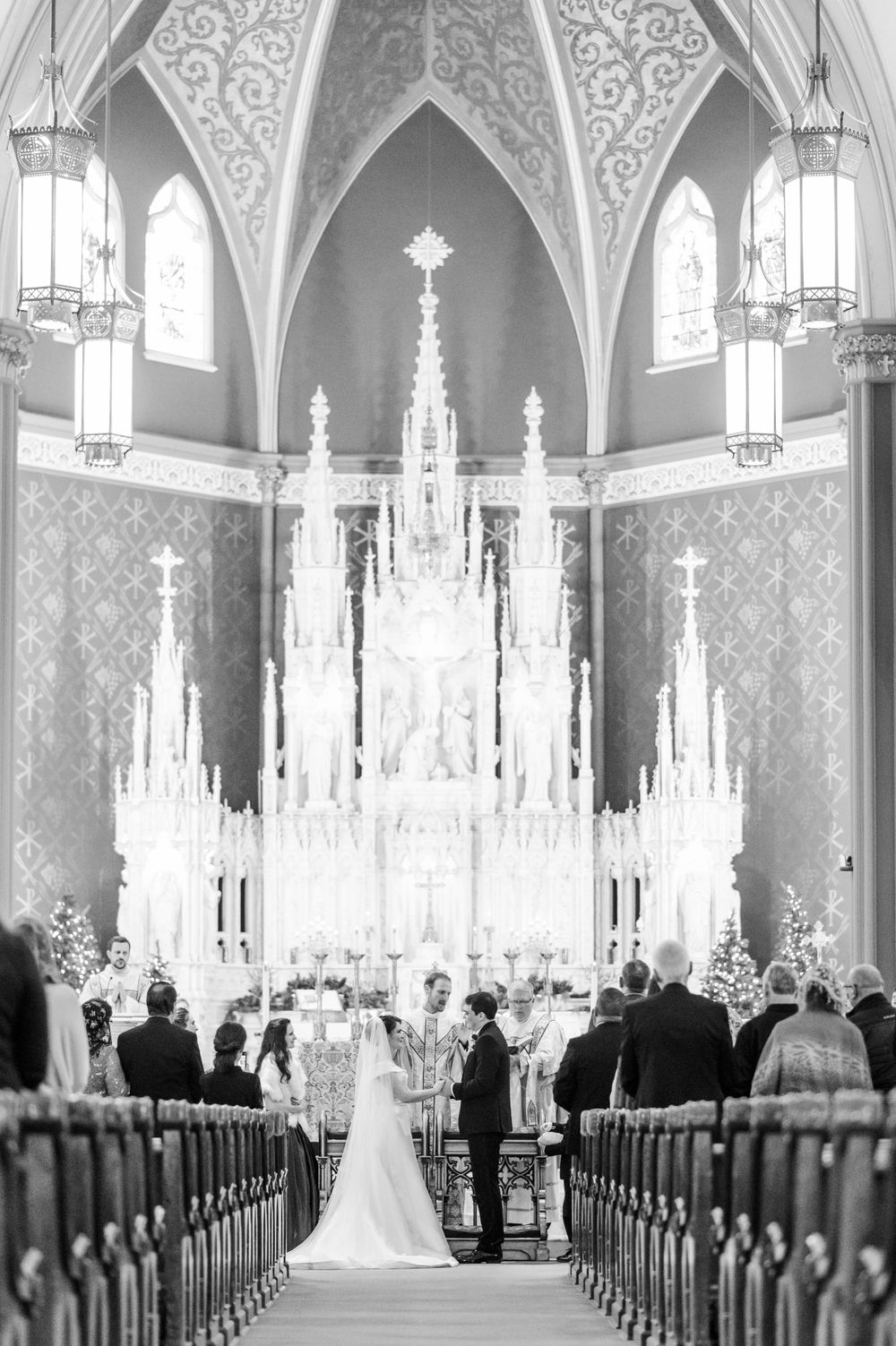 Bride and groom during their wedding mass at Holy Family Cathedral, Tulsa, OK.