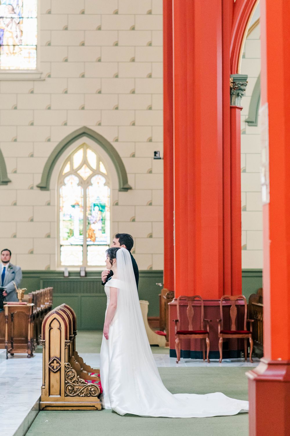 Bride and groom during their wedding mass at Holy Family Cathedral, Tulsa, OK.