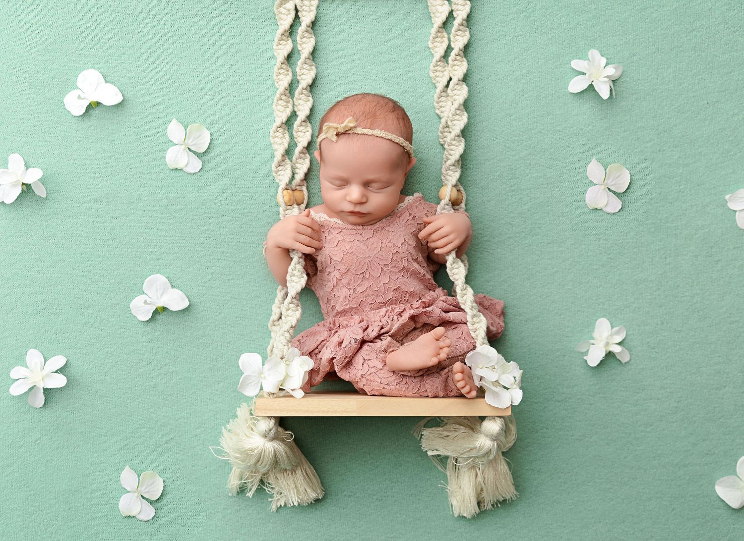 Newborn sleeping on swing. Newborn session. New Hampshire Newborn Photographer