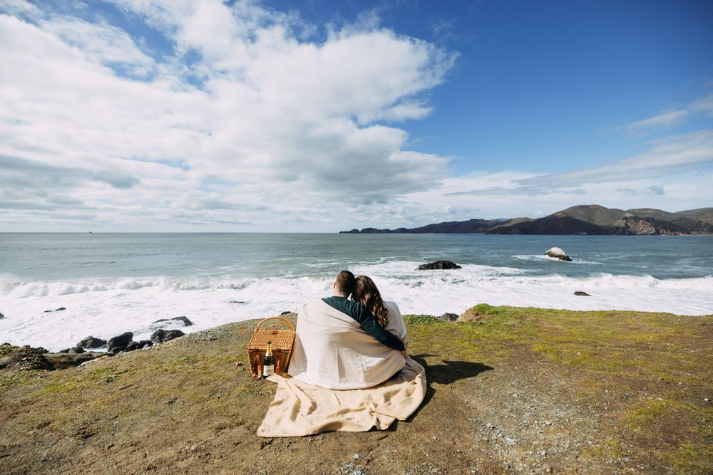 Engagement photos overlooking Pacific Ocean from Marshall's Beach in San Francisco