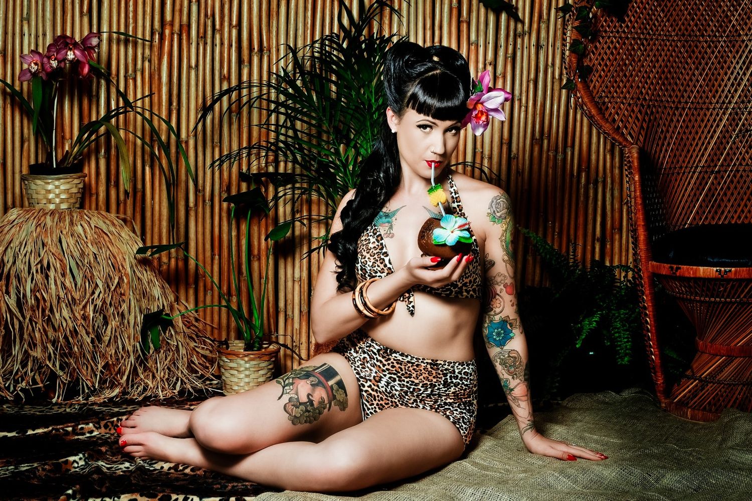 Modern  Rockabilly Pin Up girl in leopard print bikini posing for vintage photos, South Africa
