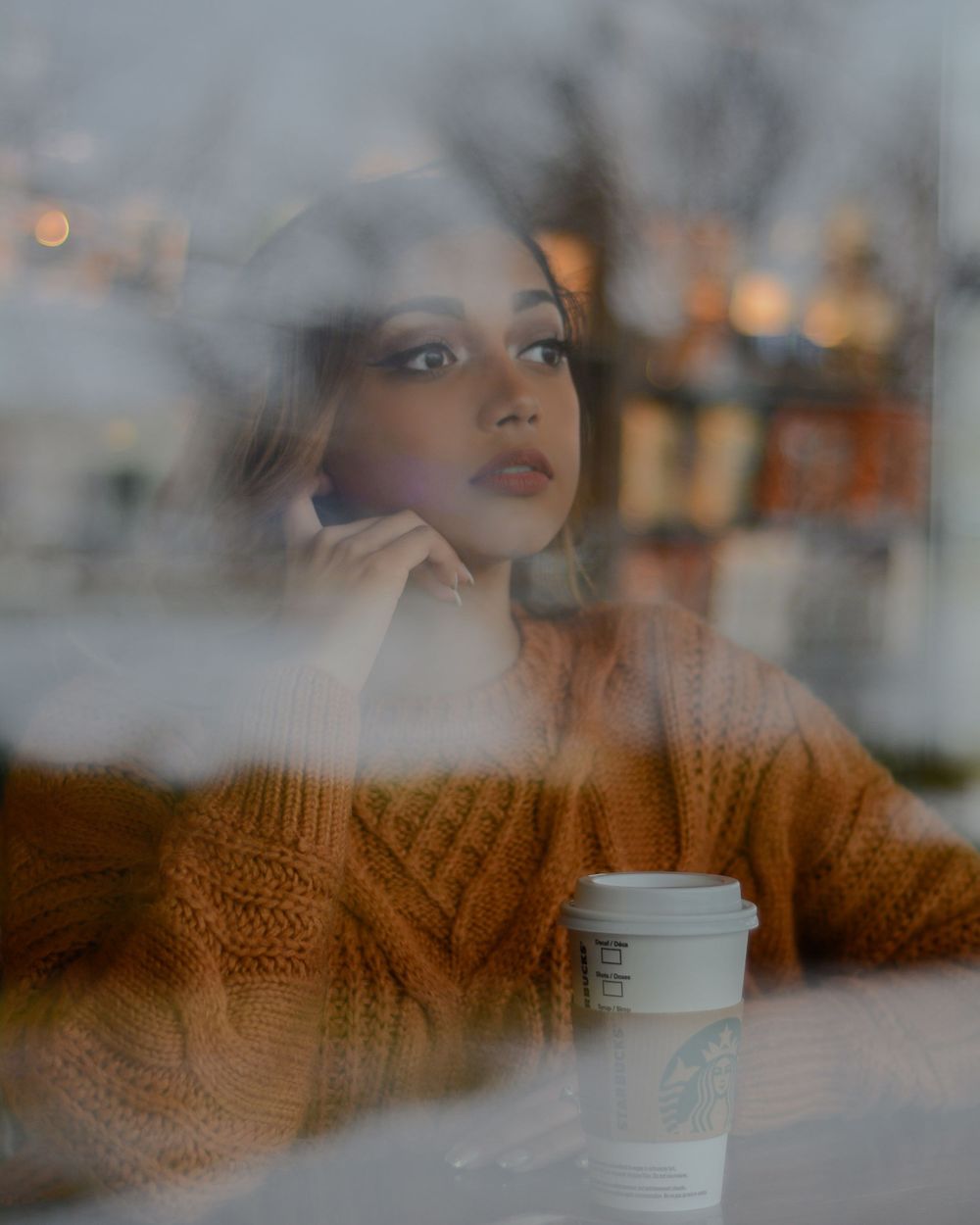 dreamy moody cafe portrait at starbucks