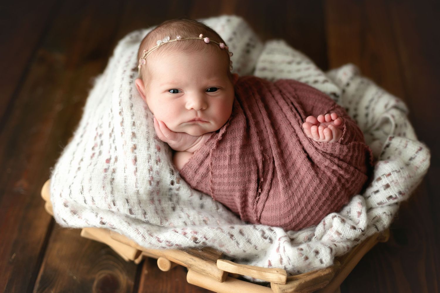 A newborn girl with a grumpy face. Greenville SC newborn photographer, Easley, SC newborn photographer, Upstate SC newborn