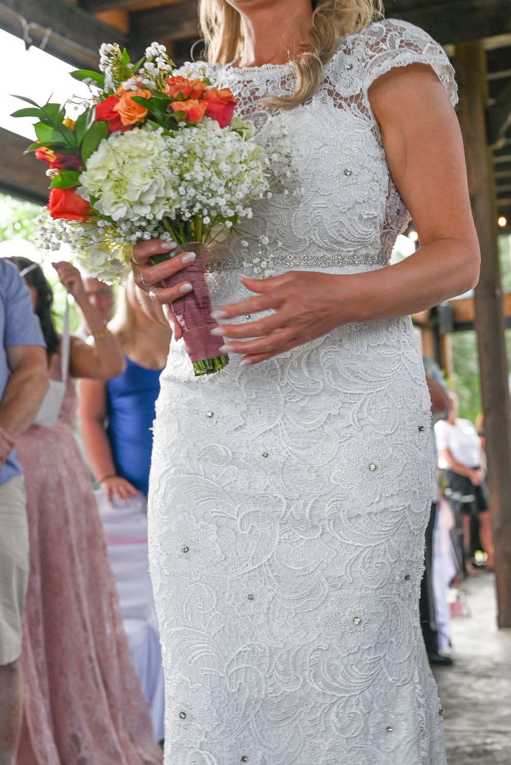 Cropped photos of brides dress.