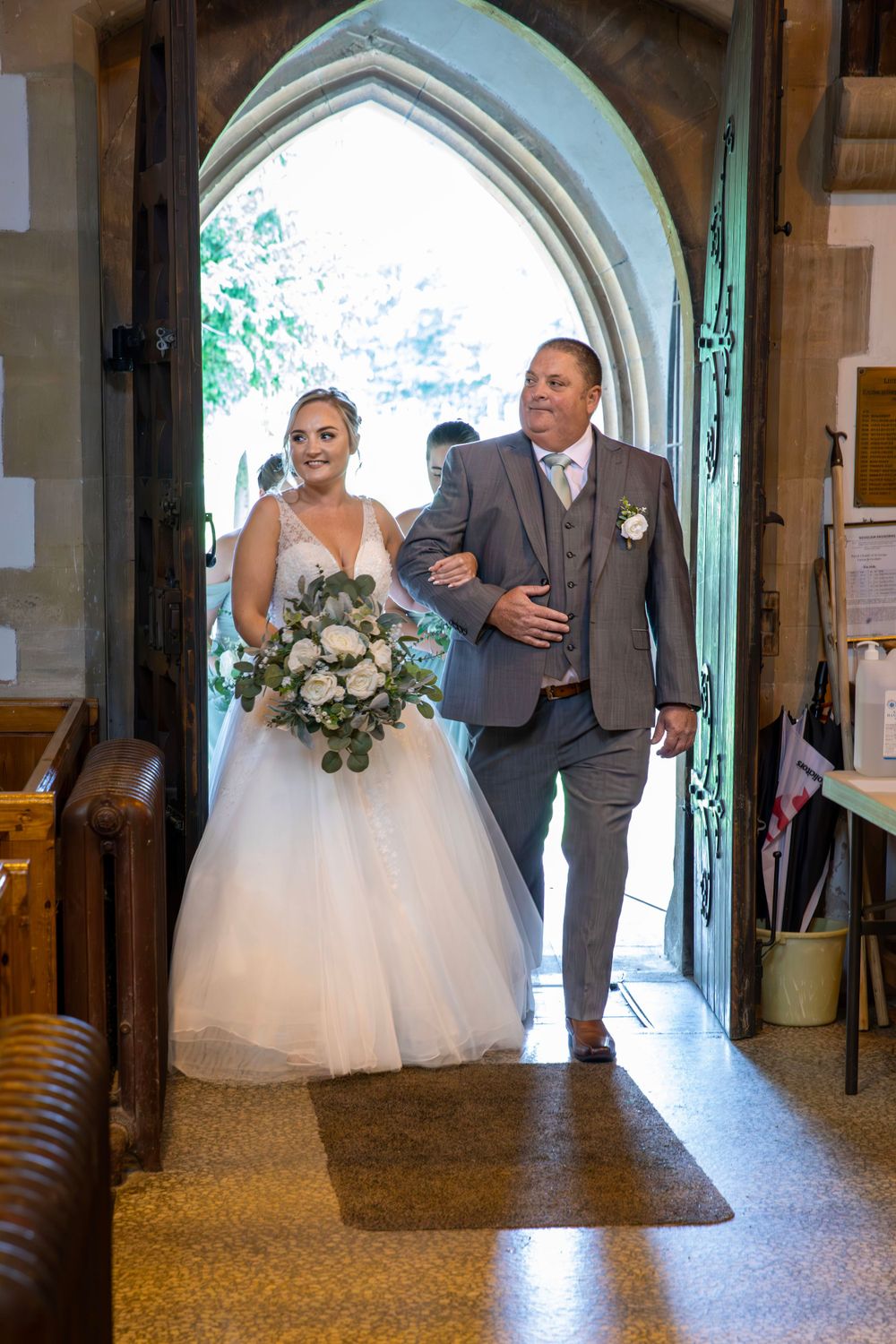 Bride arriving at church with Dad.