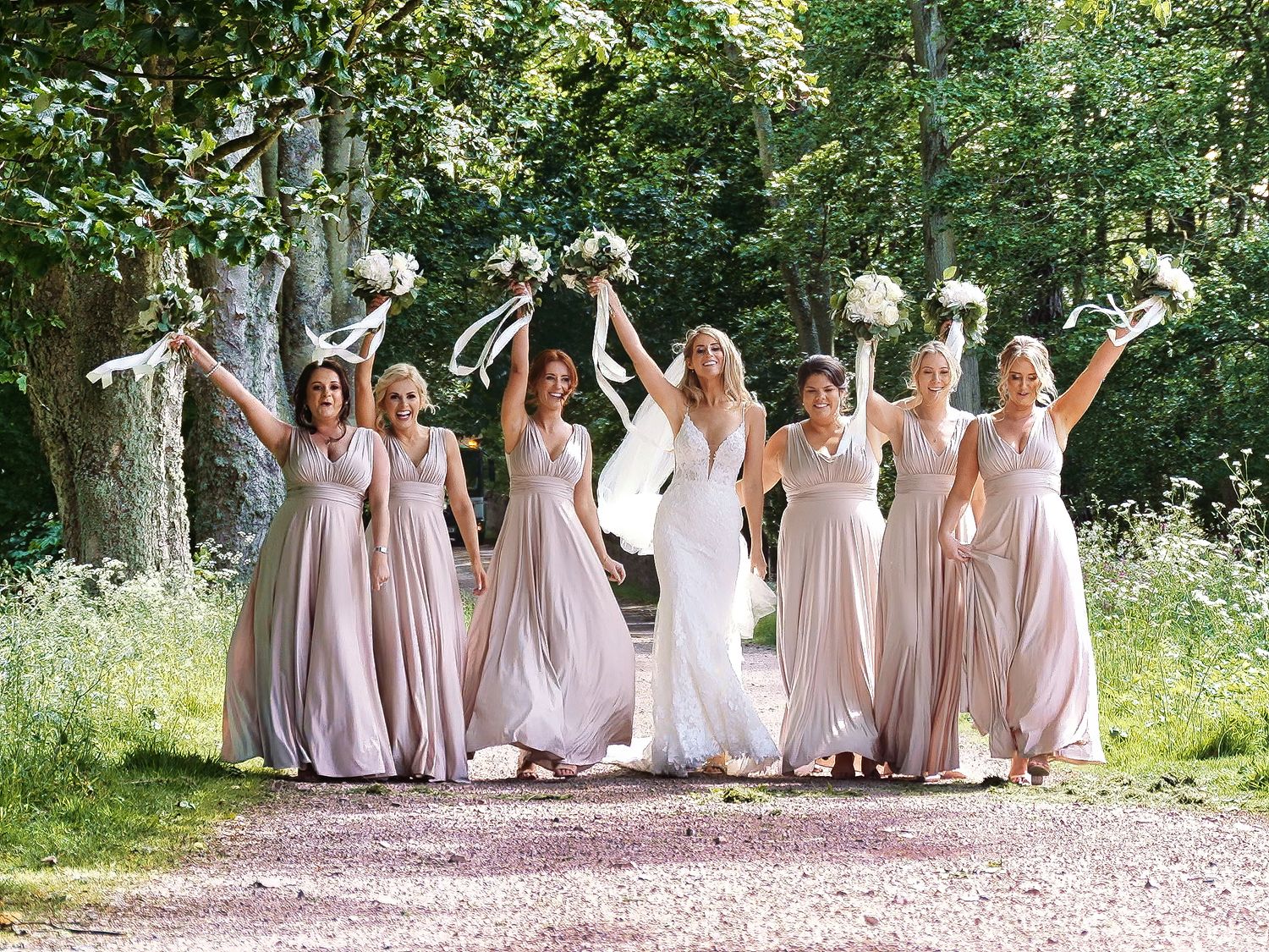 bridesmaids loving a photo shoot at a cherry tree films wedding