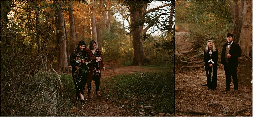 Couple walking through autumn forest path after wedding ceremony.