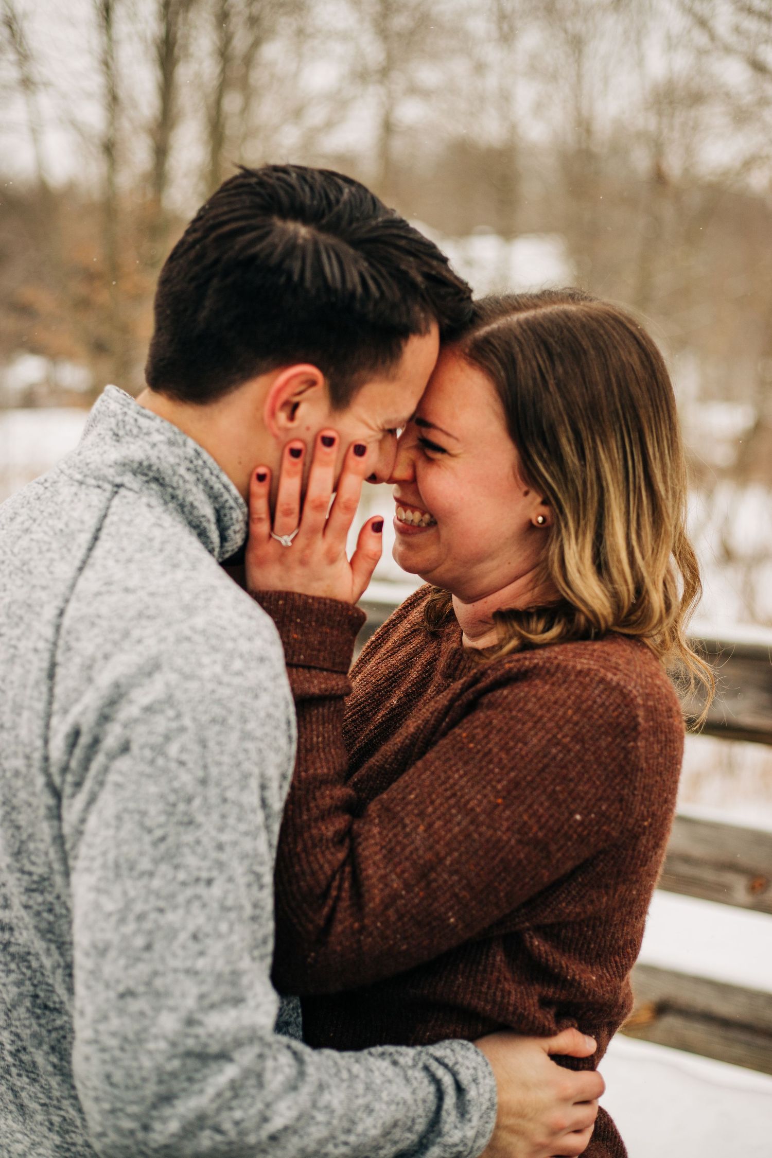 couple smiles in winter