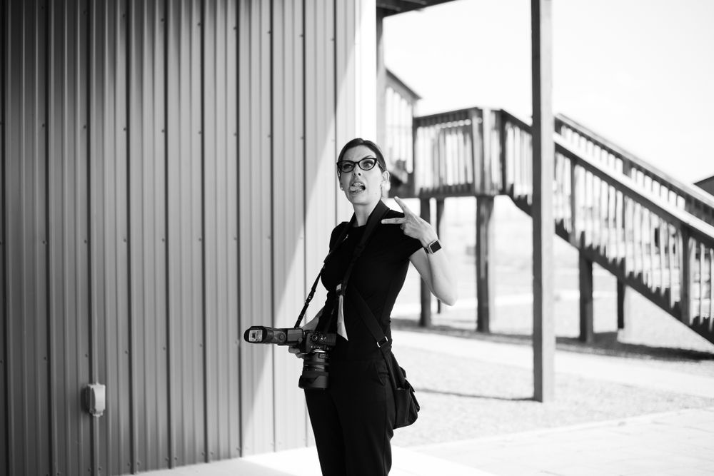 wedding photographer being silly for candid photo